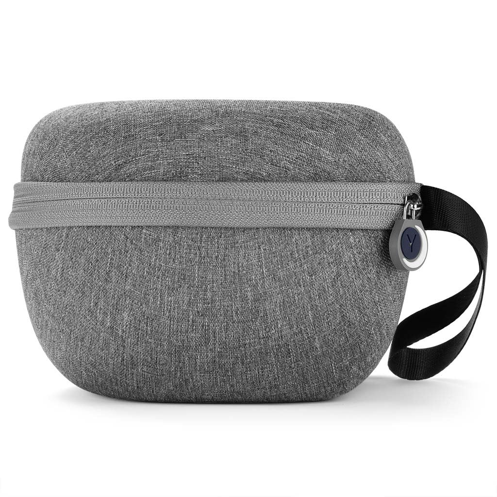 Front view of Dohm travel case showing gray fabric exterior, zipper closure and black carrying strap on white background