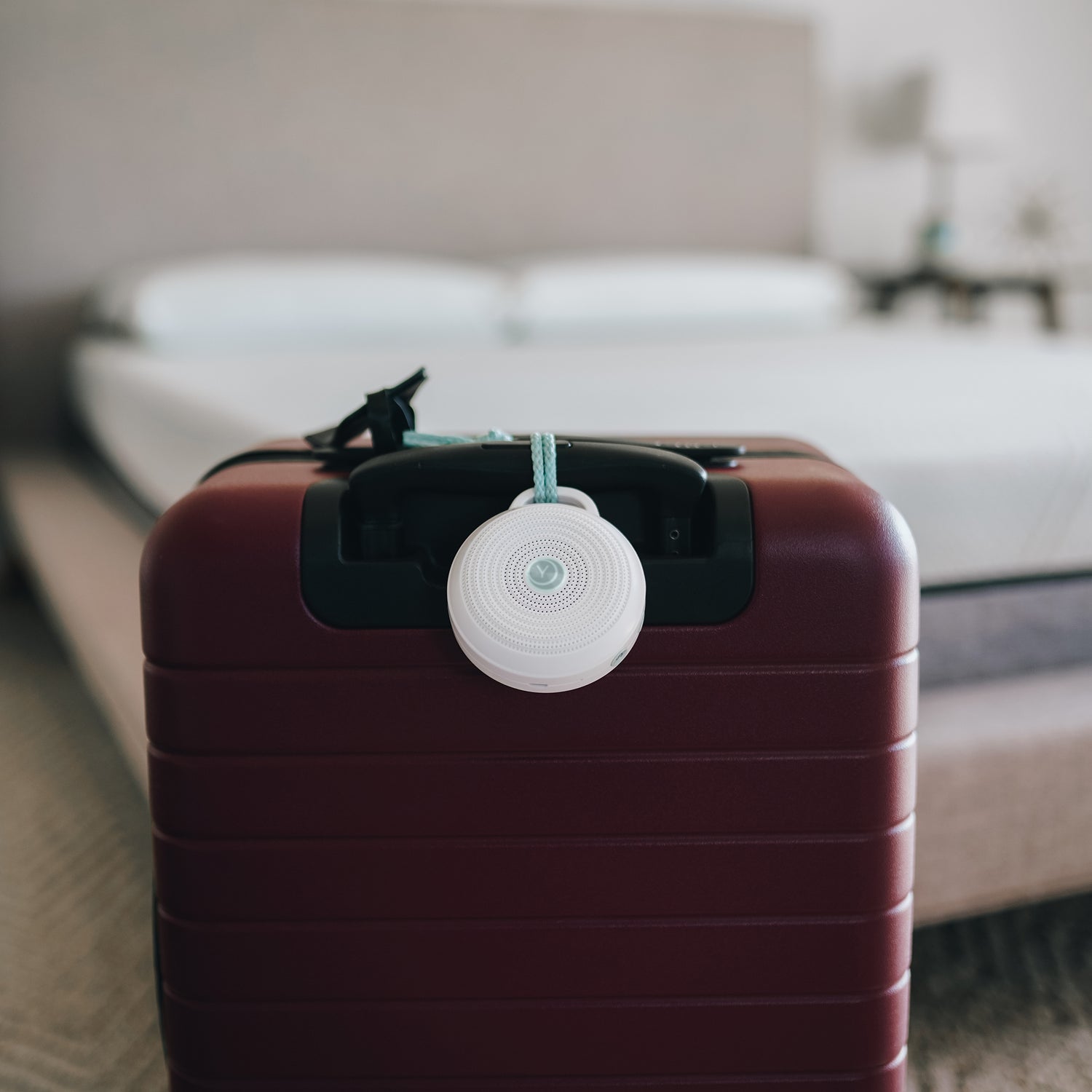 Rohm Sound Machine attached to suitcase 