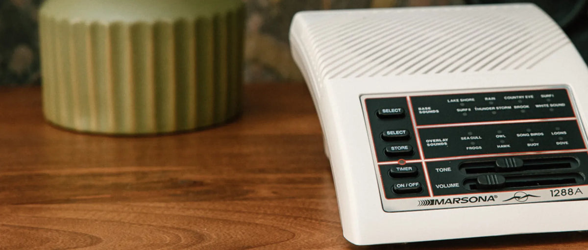 Marsona 1288A sound conditioner sound machine with tone and volume sliders on a wooden nightstand