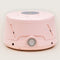 Dohm Classic - A Pink cylindrical sound machine with a gray toggle switch.