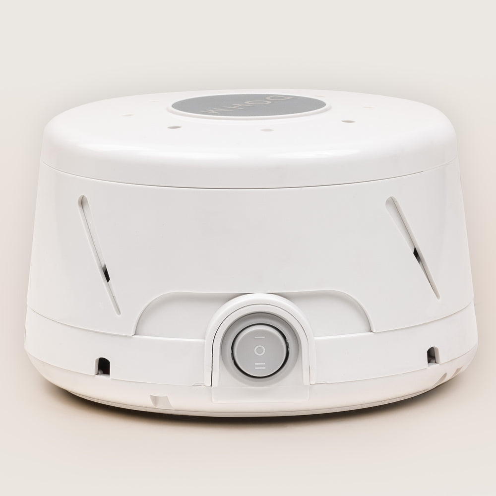 Dohm Classic - A White cylindrical sound machine with a front power switch on a plain background.