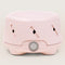 Dohm Uno - A Pink cylinderical sound machine with a gray on/off switch.